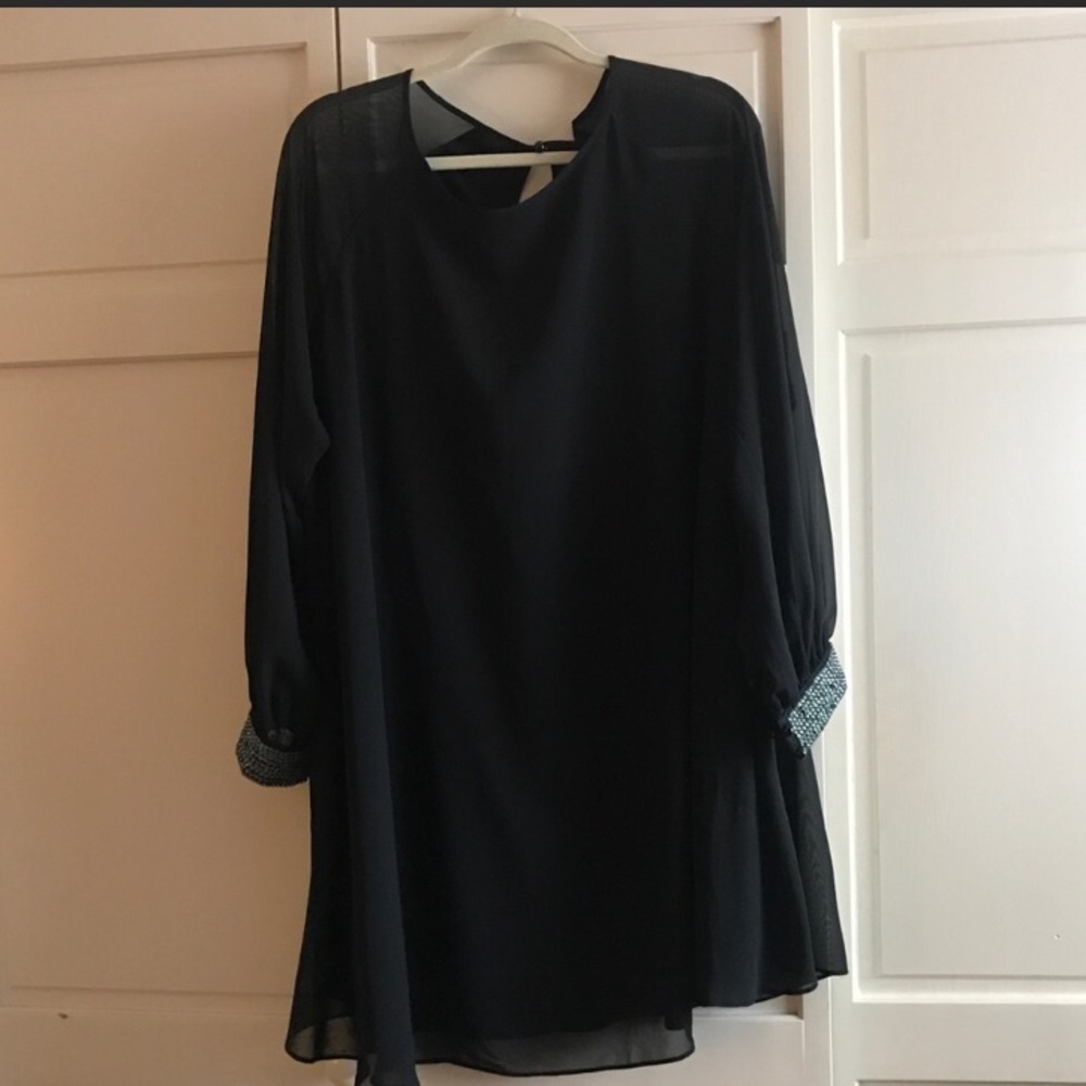 Black swing dress with embellished cuffs